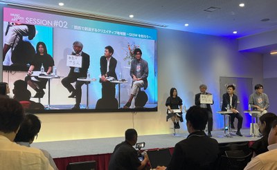 1 岸田さん　まち協代表としてシンポ登壇.JPG